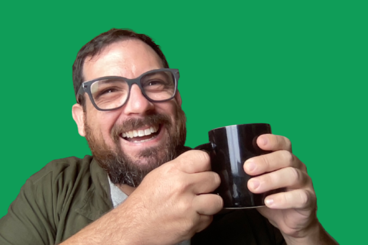 Andrew holding coffee, Spreadsheet Wizard at Better Sheets